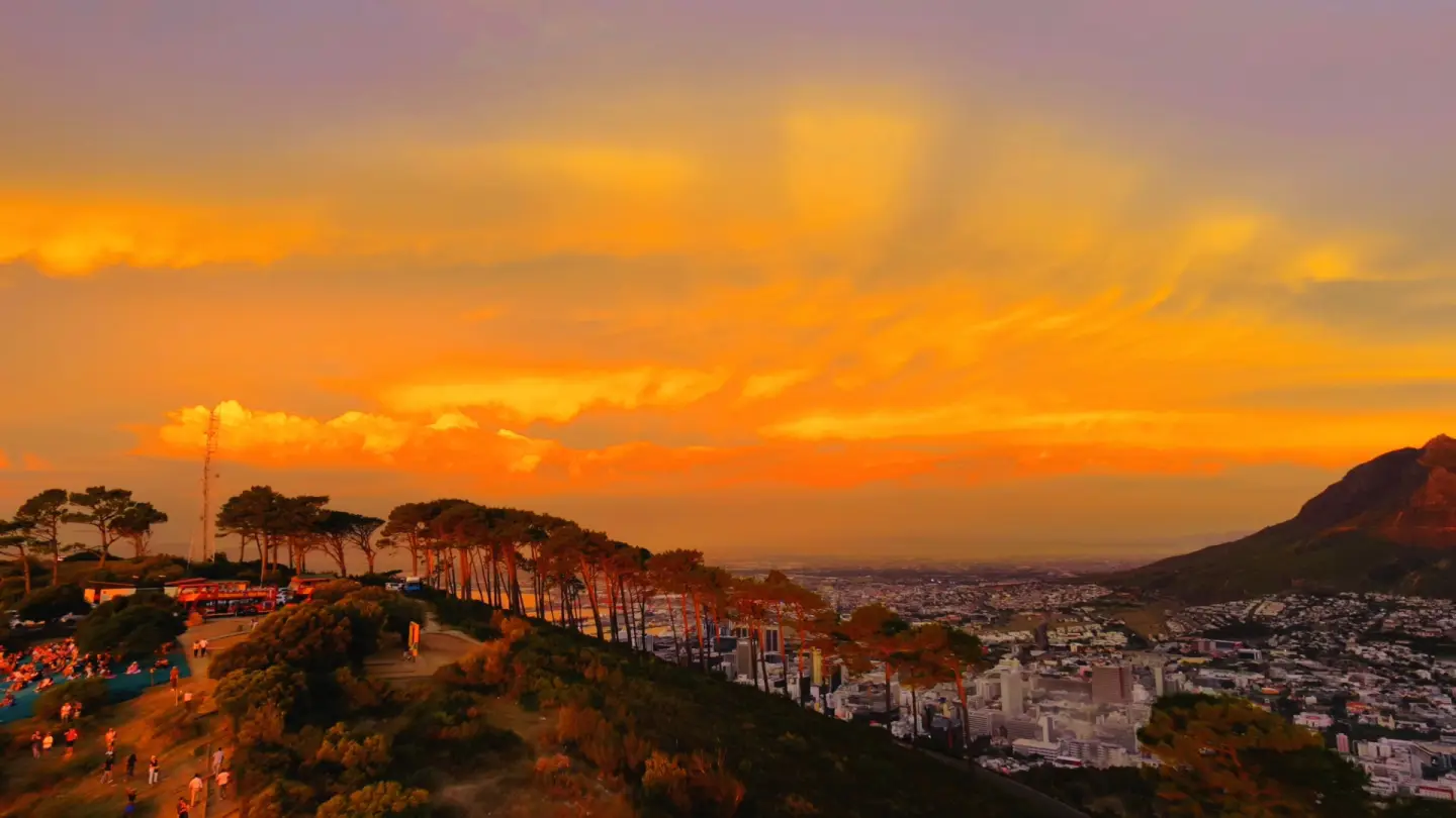 Aerial sunset over a mountain city