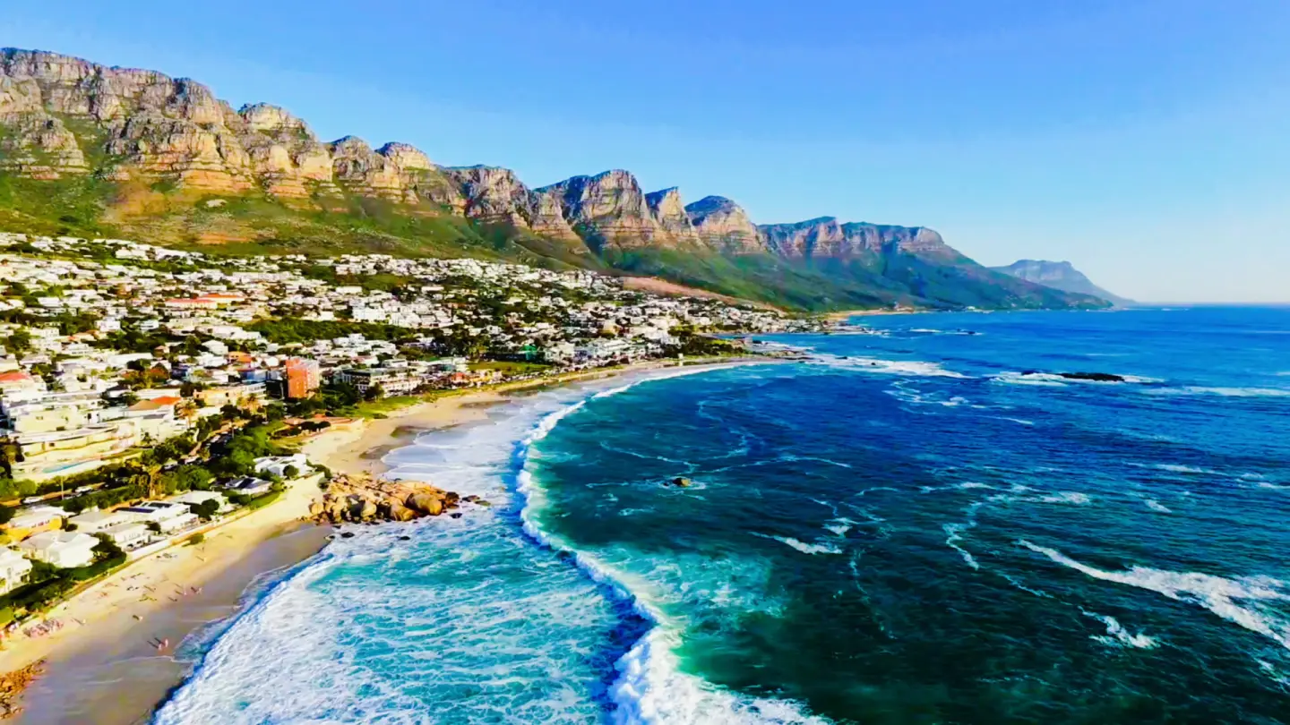 Aerial coastline with mountains and turquoise sea